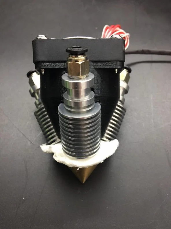 

Extruder kit Brass Multi Color Nozzle 3 IN 1 OUT 0.4mm For 1.75mm with Fan and Universal Heatsink Plastic Part for 3D printer