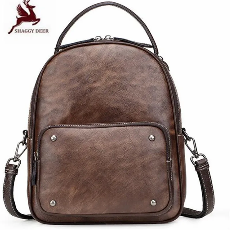 

Quality cowhide Retro lady Personality Leather Travel Bag solid Unisex Backpack