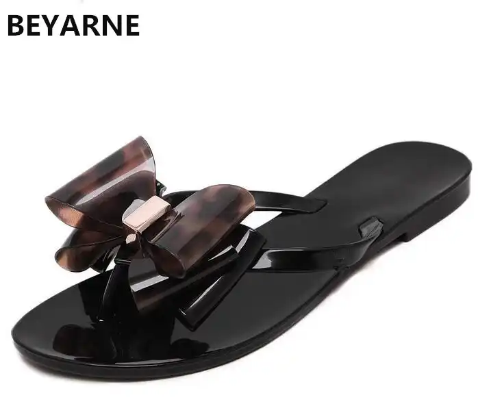 bow tie jelly flip flops