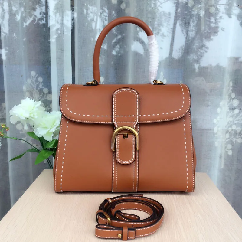 Simple and fresh women leather handbags fashion star with the cover of the outer seam white line horseshoe buckle women bag