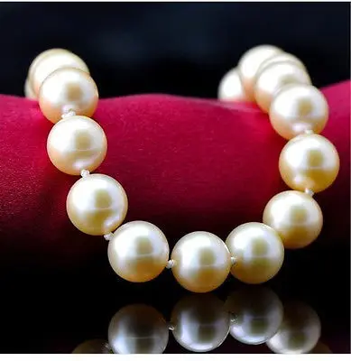 

Wholesale FREE SHIPPING NATURAL 18"9-10MM SOUTH SEA GENUINE PERFECT AAA GOLD PINK PEARL NECKLACE 14KGP