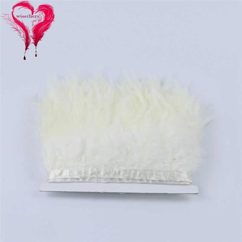 1 white rooster saddle feather trims 1