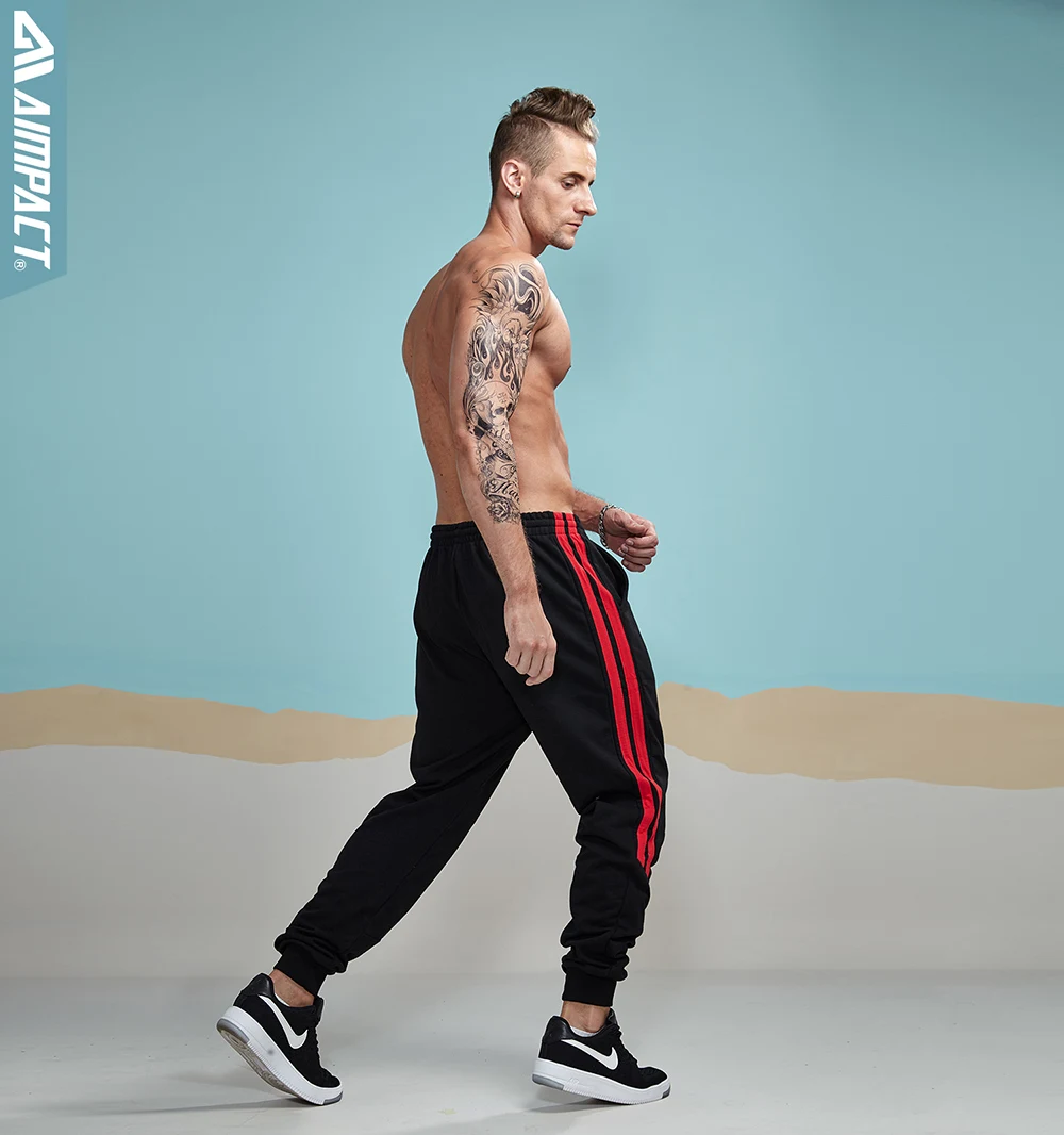 Aimpact 2017 бегунов Брюки для девочек Для мужчин полосатый хлопок Треники шнурок эластичный пояс Mid Rise спортивные штаны Бодибилдинг Брюки для