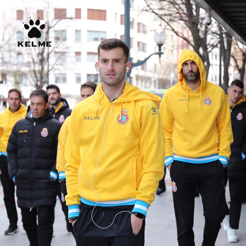 soccer jersey over hoodie