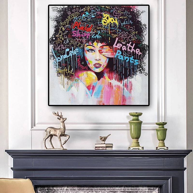 woman with afro painting