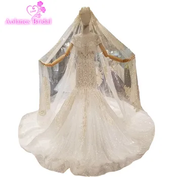 

2018 Luxury Champagne Lace Tassel Sequins Sleeveless Chapel Train Bridal Gowns Illusion Mermaid Wedding Dresses With Long Veil