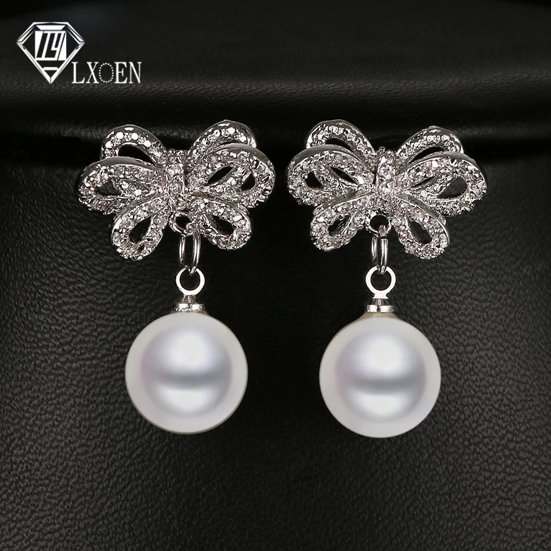 

LXOEN Elegant Simulated Pearl Drop Earrings With Flower Shape Silver Color Crystal Earrings Jewelry Gift Pendientes