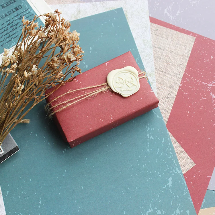 moodtape. Colourless non-sticky material paper background collage underneath gift wrapping seal hand tear DIY hand account