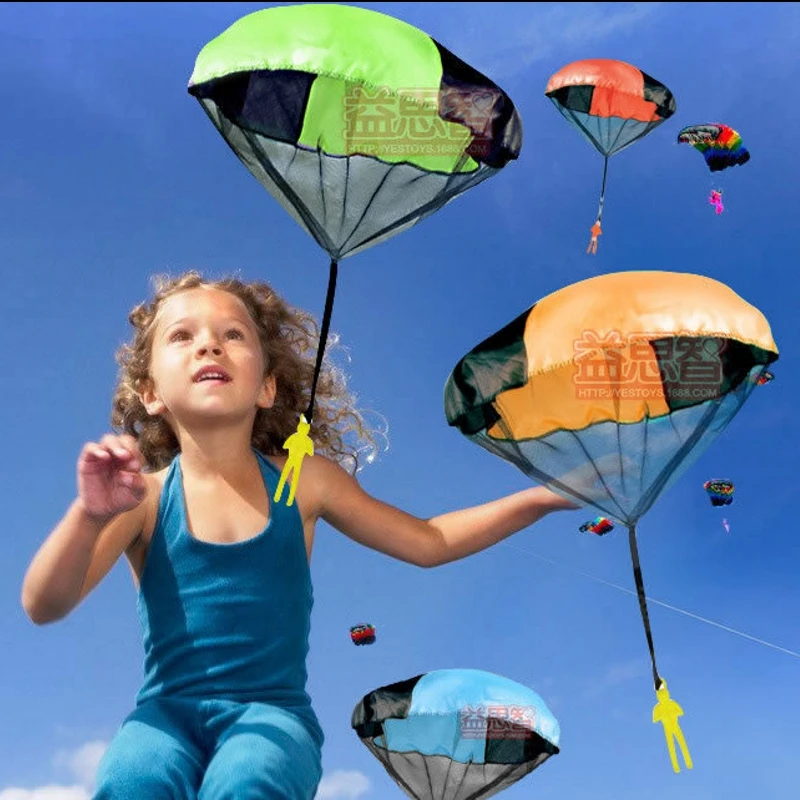 Children outdoor sportsman throwing mini game parachute Soldier fitness