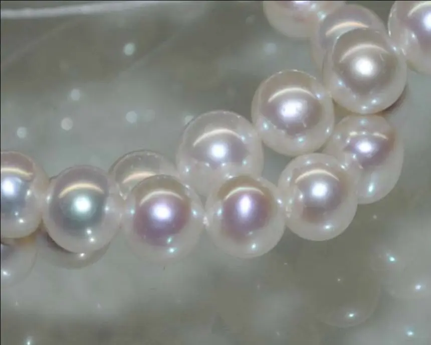 

FREE shipping>>>>>>9-10MM AAA+ PERFECT WHITE SOUTH SEA ROUND PEARL LOOSE BEADS 6.07