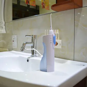 

Portable Dental Water Flosser and Oral Irrigator for Dental Care/Oral Health Battery Operated for Travel and Cleaning 2018