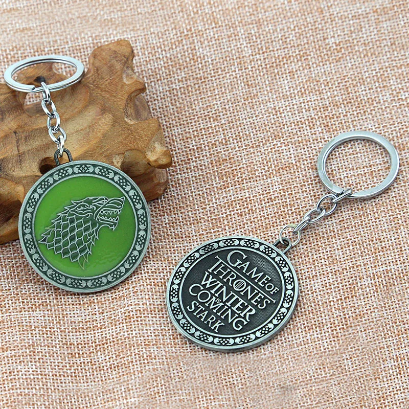 

Game of Thrones GLOW in the DARK Keychain House Stark Targaryen Red Dragon Keychain Direwolf Keyrings Lannister Lion key chain