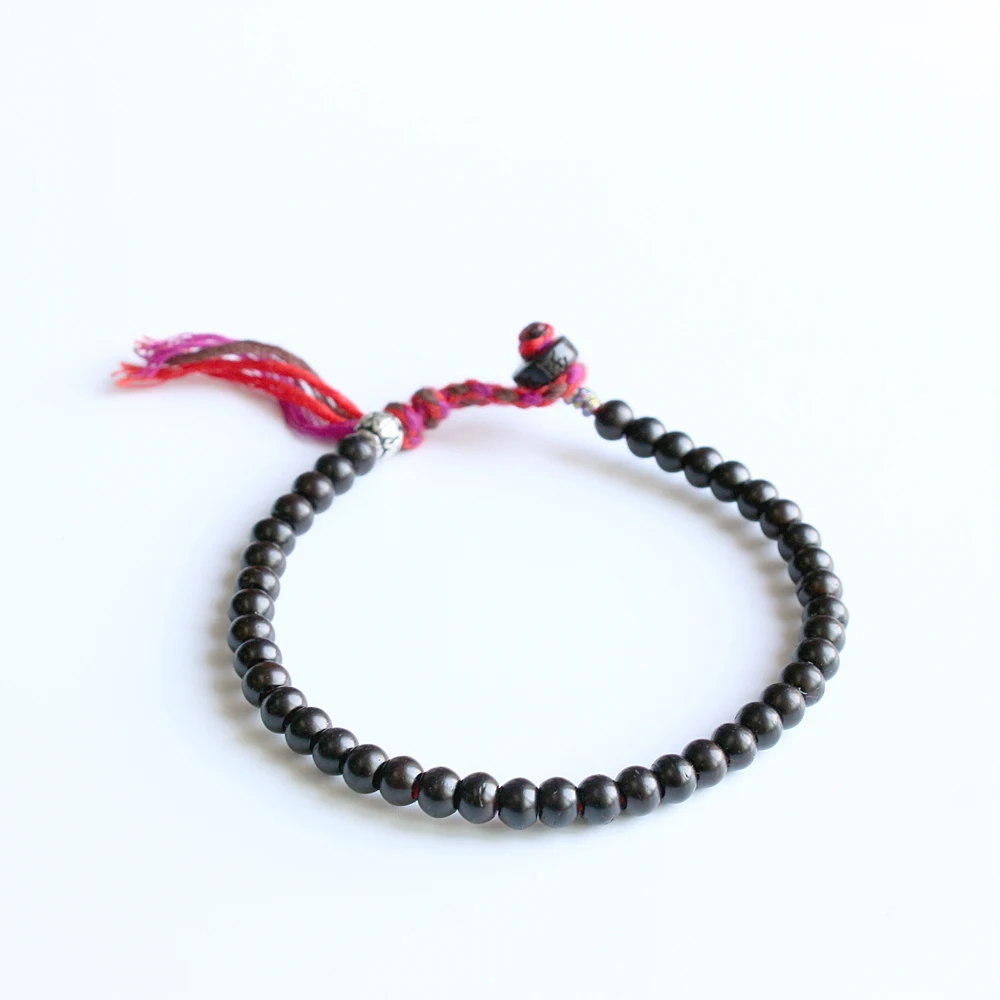 

Tibetan buddhist handbraided lucky rope Natrual Coconut shell beads with protective totem Charm bracelet elegant simple bangle