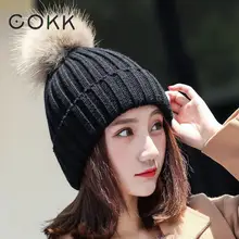 COKK 15cm Raccoon Fur Ball Hat Pom Poms Winter Hats For Women Lady Girls Hat Knitted Beanies Cap Brand New Female Cap Thick Warm COKK 15cm Raccoon Fur Ball Hat Pom Poms Winter Hats For Women Lady Girls Hat Knitted Beanies Cap Brand New Female Cap Thick Warm