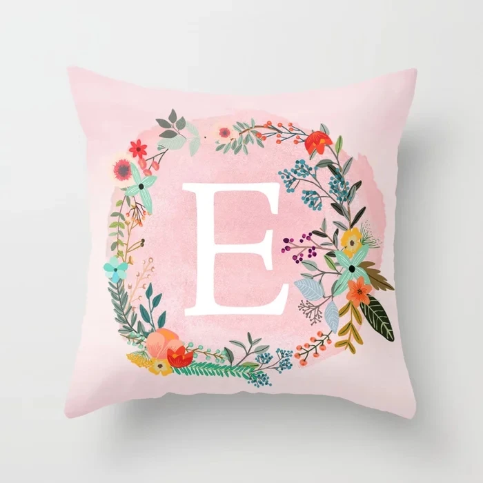 flower-wreath-with-personalized-monogram-initial-letter-e-on-pink-watercolor-paper-texture-artwork-pillows.webp