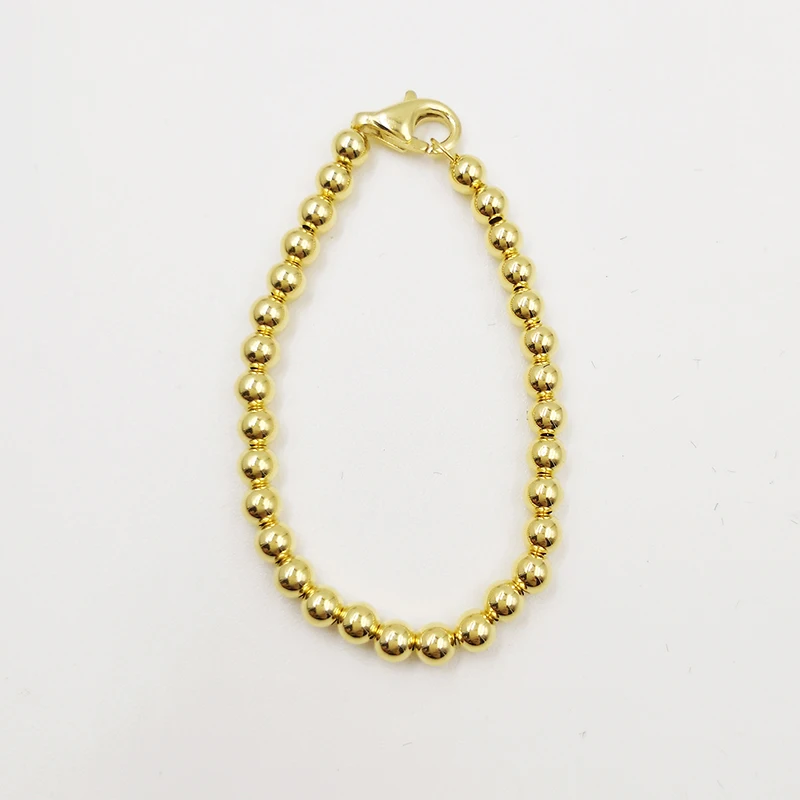 yellow gold small bead strand bracelet for new baby 
