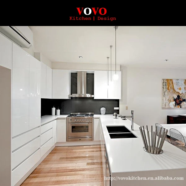 Luxury high gloss white lacquer kitchen with BLUM hardwarein