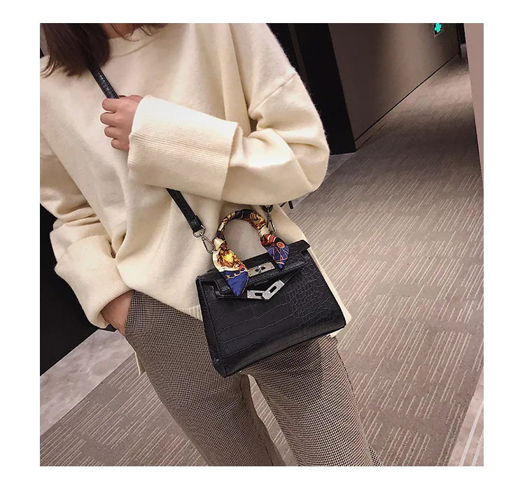 2019 جديد إمرأة حقيبة جلدية الاتجاه نمط الحجر مشبك حقائب كتف عارضة حمل بسيط الأعلى مقبض حقائب اليد