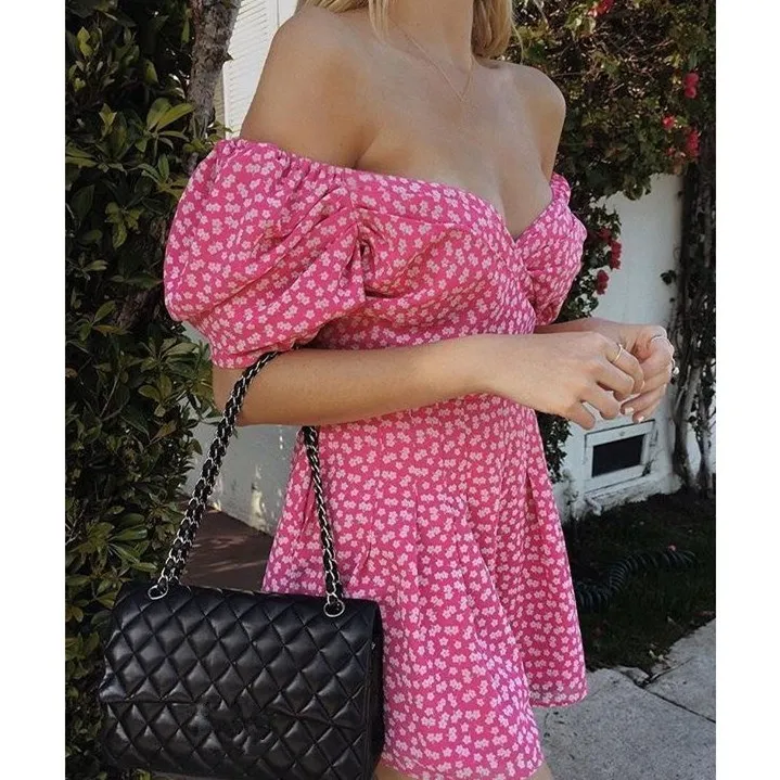 

Women Sweet Daisy Flower Print Romper Vintage V Neck Puff Sleeve Short Empire Jumpsuit Loose A-Line Holiday Beach Romper