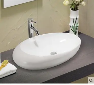 

Wei yu on the stage of the basin that wash a face basin large size basin sink sink white oval creative personality
