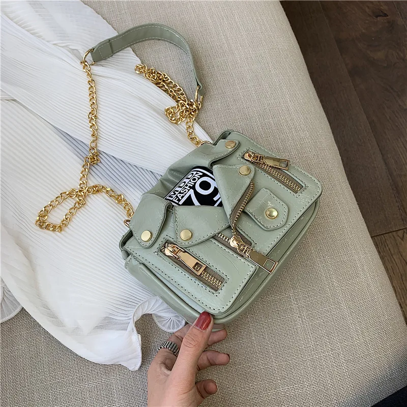 

Female bag designer hand holding fashionable rivet motorcycle shoulder bag new summer fashion bag chain cross body jacket bag