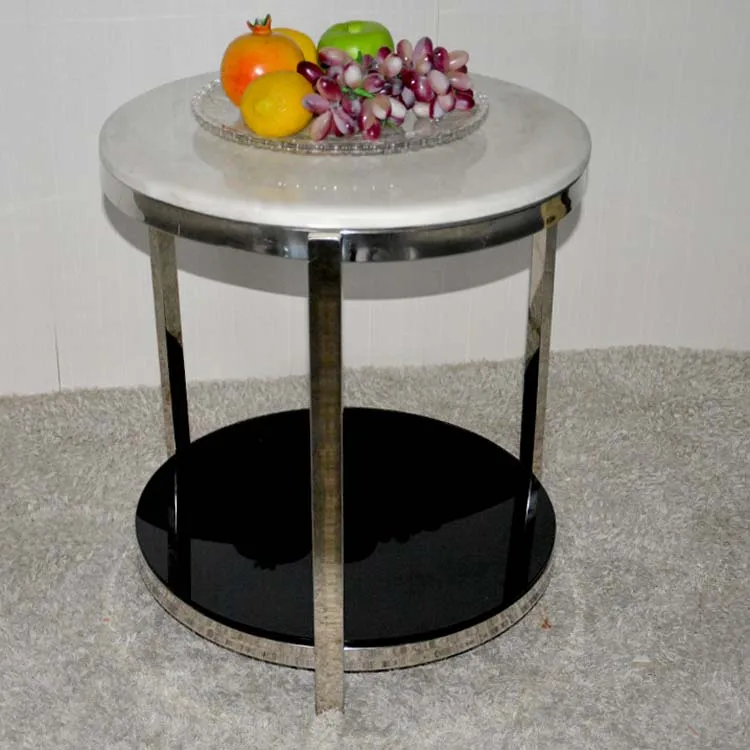 Small round tea table marble. Stainless steel. The sofa side table.