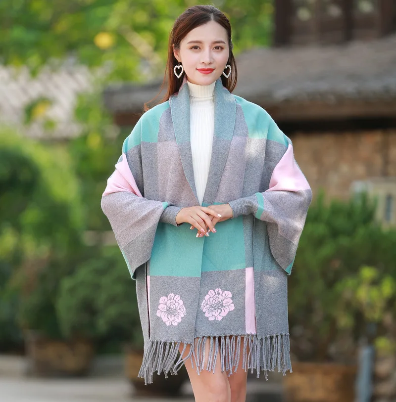 Female autumn and winter large plaid shawl dual-use cloak tassel double-sided jacquard bat sleeve sweater jacket