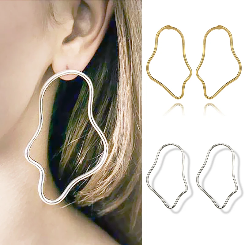 

2018 new creative facial contour polygon gold hollow geometry large earrings silver facial punk face simple large hollow jewelry