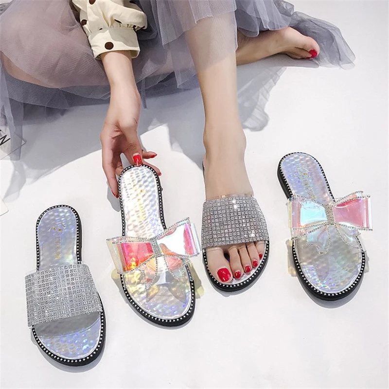 

New Arrival Ladies Flip Flops 2019 Summer classic laser Transparent sequin crystal Butterfly knot beach shoes Women Slippers