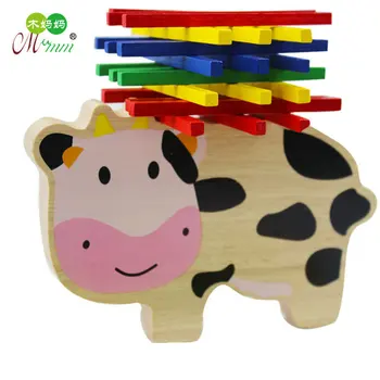 

Free shipping Children's COW Balance wooden puzzle spell piling up his building block. Wood Family early parent-child block game