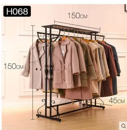 Clothes shop display rack nakajima double shelf women's clothing store parallel bars hanging clothes rack in the middle .