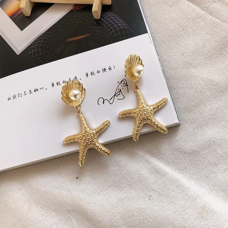 

Gold Starfish Shell Conch Pearl Earrings Natural Shell Cowrie Huggie Hoop Charm Sea Earrings Beach Marine Jewelry Stock