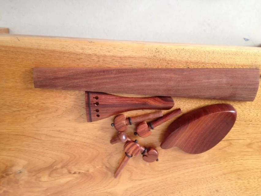 

4/4 size violin parts made of rosewood , violin fittings
