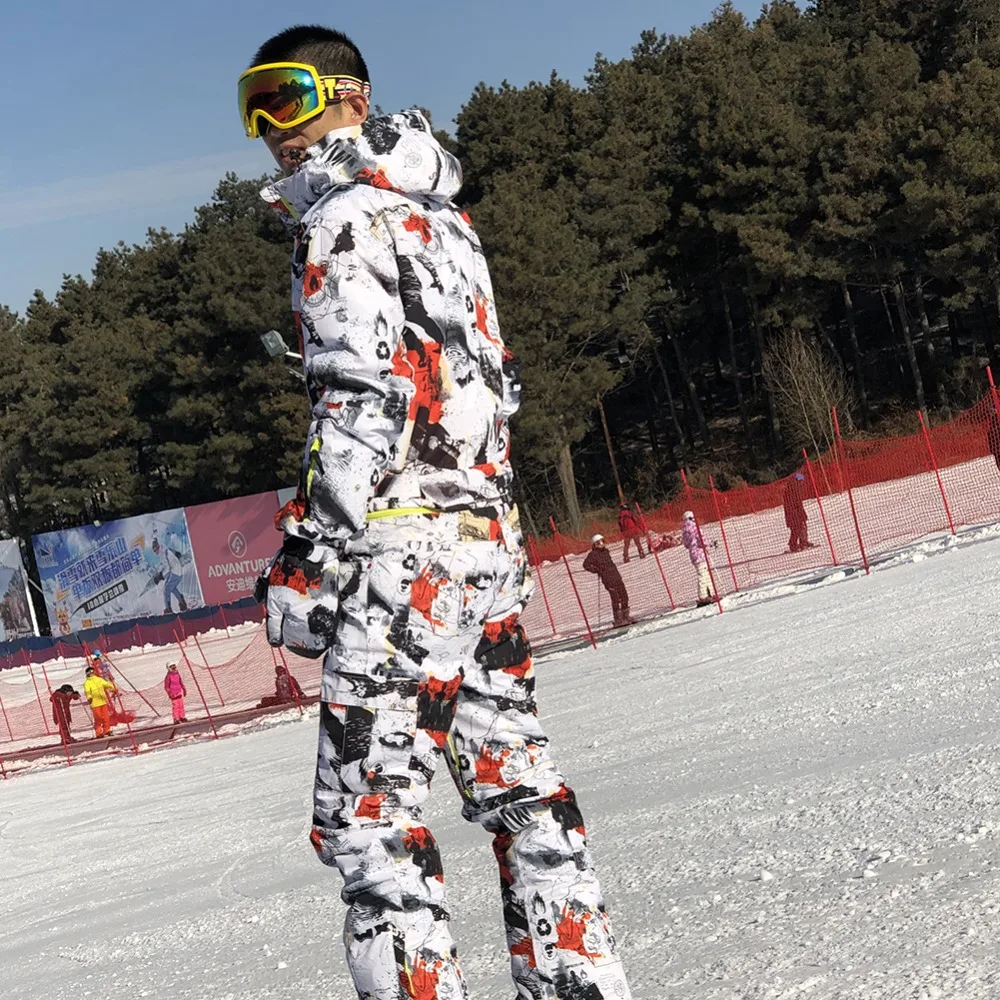 SAENSHING على الجليد سترة قطعة واحدة بدلة تزلج الرجال الشتاء للماء سميكة الدافئة تزلج بذلة الرياضة على الجليد و التزلج الجبلية SAENSHING على الجليد سترة قطعة واحدة بدلة تزلج الرجال الشتاء للماء سميكة الدافئة تزلج بذلة الرياضة على الجليد و التزلج الجبلية