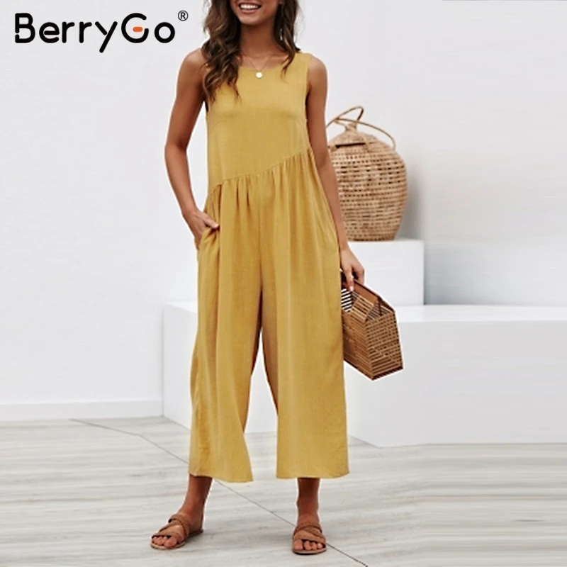 

BerryGo women rompers Sexy wide leg solid jumpsuit Sleeveless backless plus size jumpsuit Casual ladies summer loose romper 2019