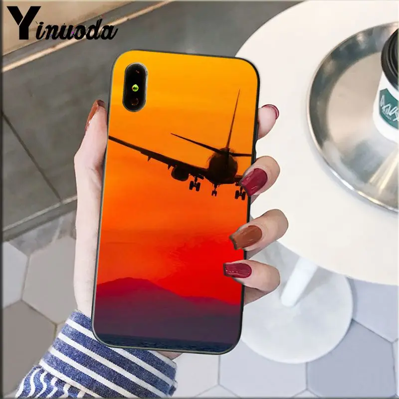 Airplane travel in the sunset