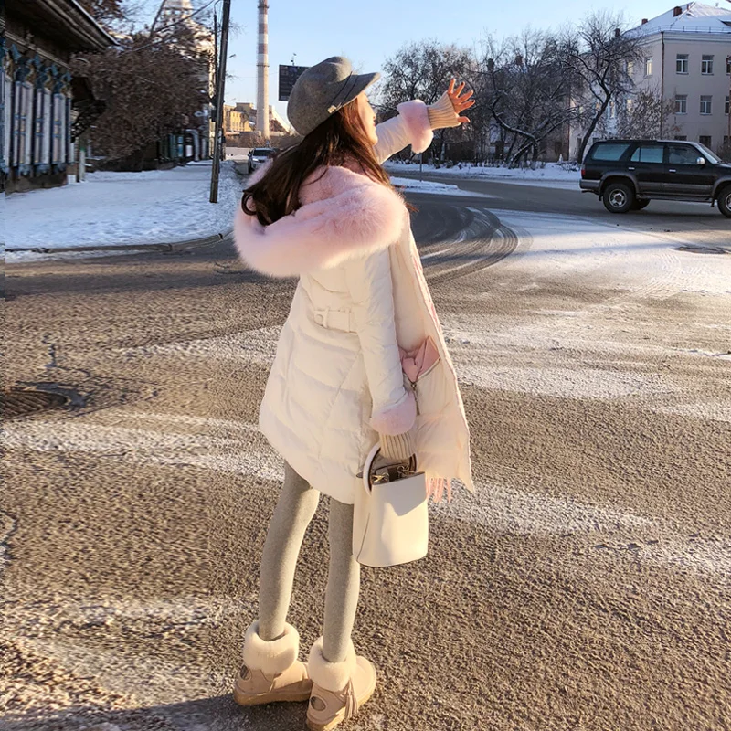 

Mishow Hooded with fur white solid women down coat 2019 spring pockets long zipper casual regular down jacket MX17D8825