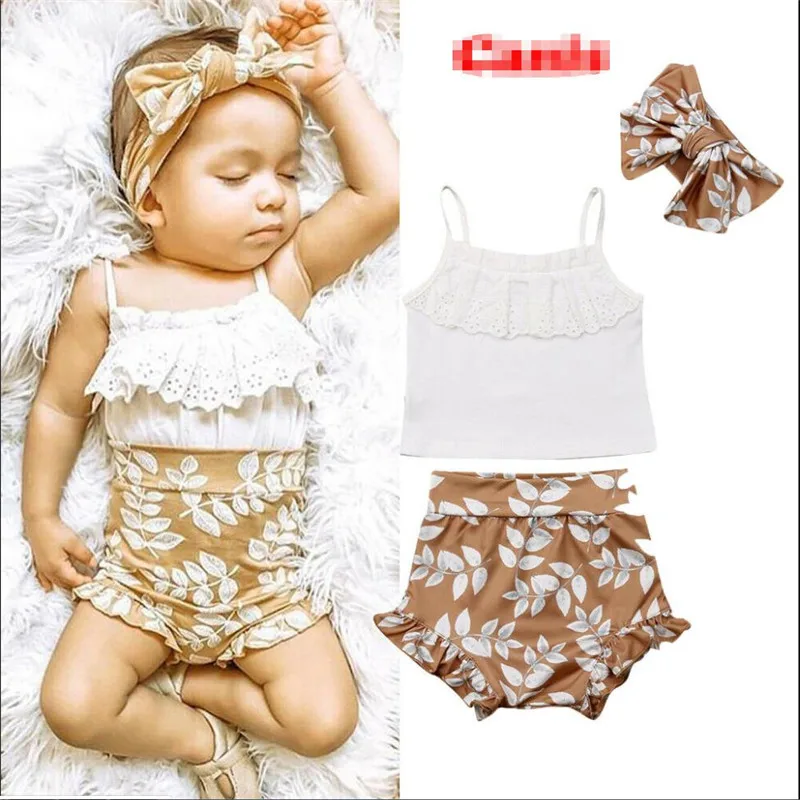 

Cute Toddler Baby Girl Summer Clothes 3Pcs Sets Lace Sling Tank Tops+Floral Ruffled Shorts+Bow Headband Girl Cotton Outfit 0-24M