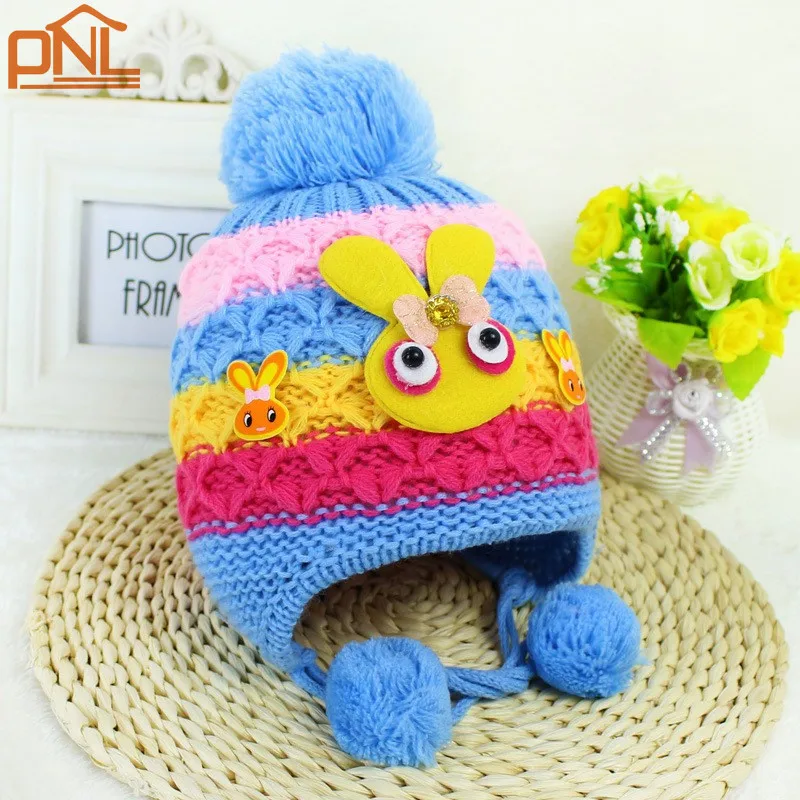 

2019 0-12M Baby Crown Hat warm ear bomber children ear knitted hat cap boys girls Hanging ball winter hats caps