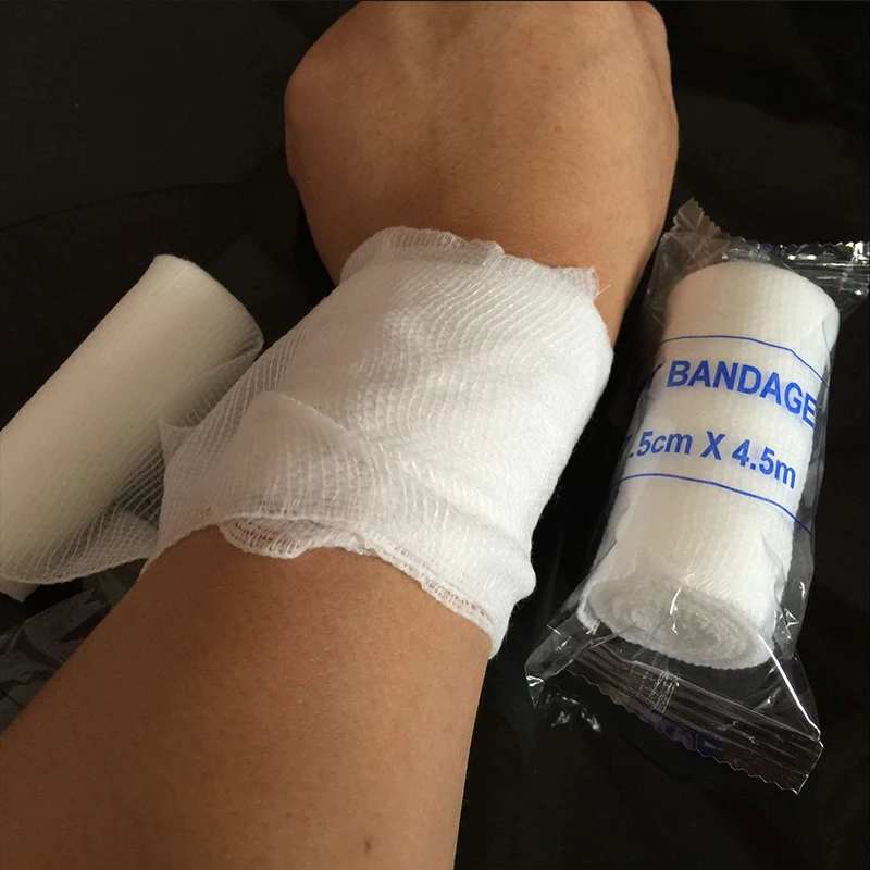 Cintas elásticas médicas para primeros auxilios, suministros de vendaje, rollo de envolturas elásticas de compresión adhesivas, no tejidas, blancas