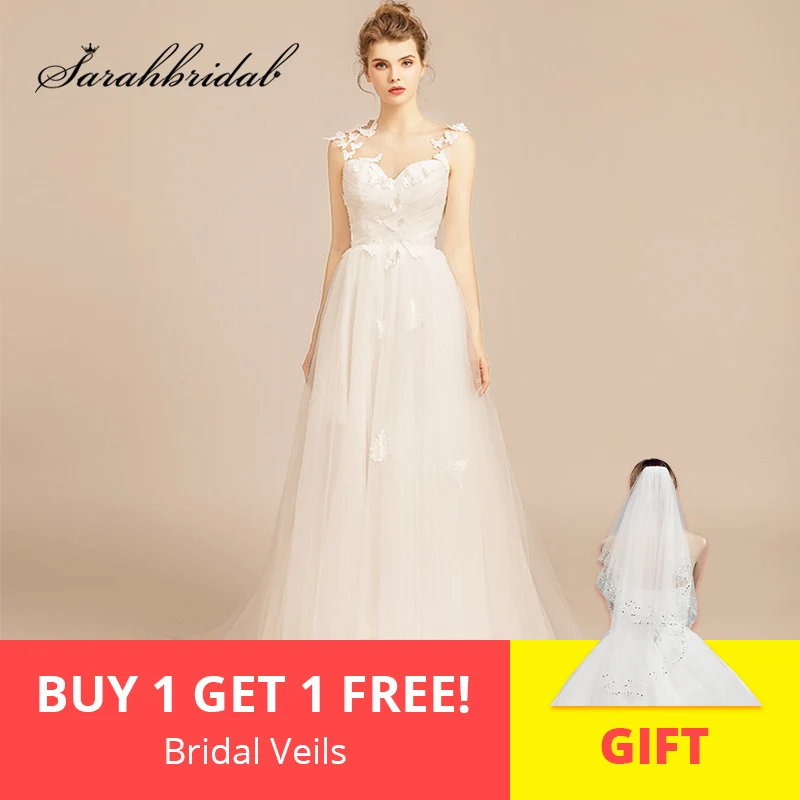 

2019 Simple White Beach Wedding Dresses Long Lace Applique Tulle Open Back Illusion Neck vestido de noiva Celebrity Bridal Gown