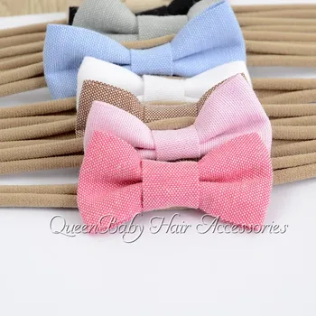 

30pcs/lot Mini Bow Headband Solid Baby Bow Hair Band Fabric Hair Bow Nylon Baby Headband Queen Baby