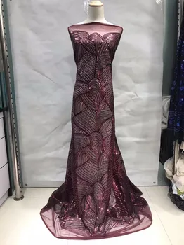 

In the latest African lace fabrics in 2018, the evening gown with sequined fabrics and high quality tulle lace fabric ZM101