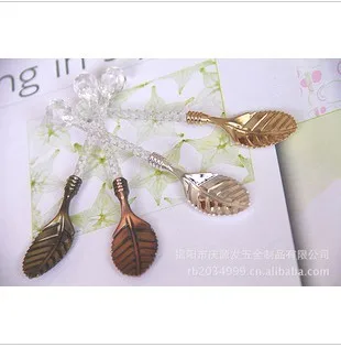 

Wholesale Free shipping creative leaves shape with crystal handle zinic alloy spoon (JY25)