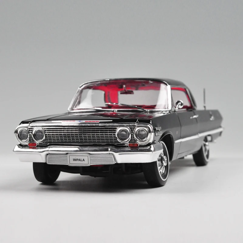 автомобиль chevrolet imala (1963) (1:18) автомобиль chevrolet imala (1963) (1:18)