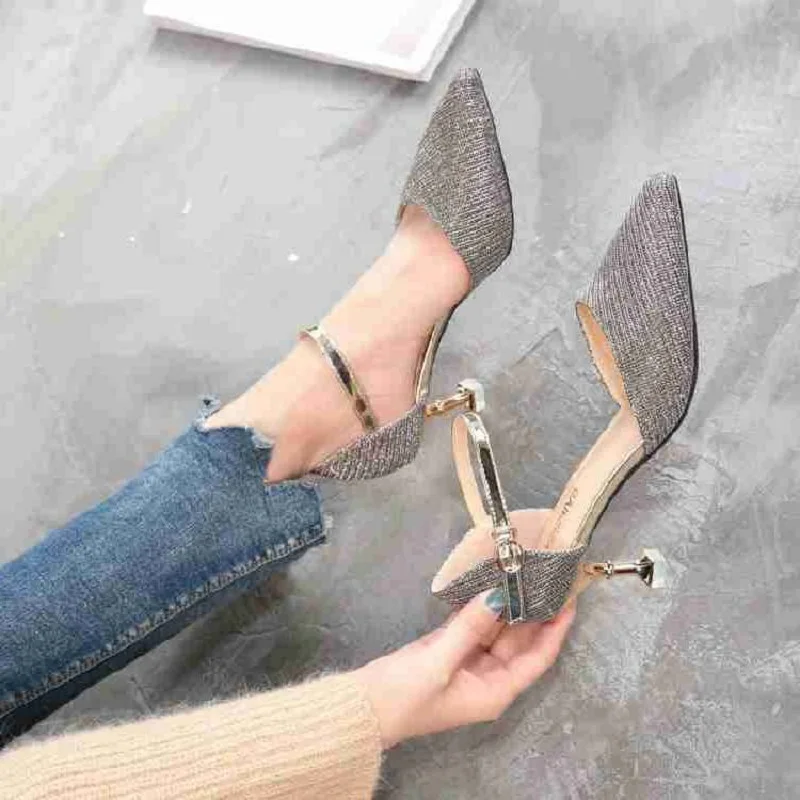 

Black high heel women's sense with 2019 spring tide rivet pointed shallow mouth single shoes professional work shoes