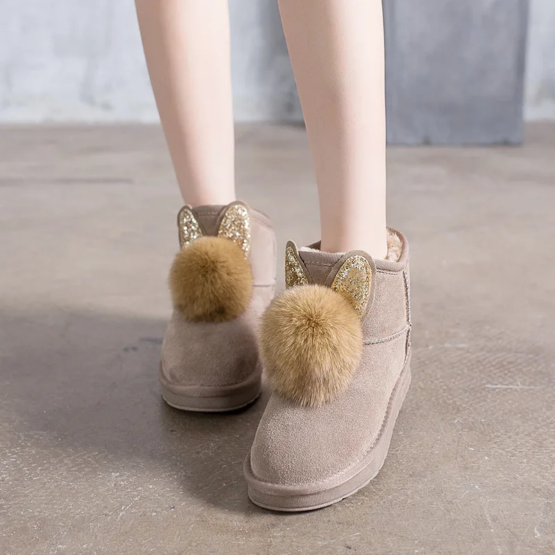 

Snow boots female 2018 autumn and winter new rabbit fur hanging ball round head thick leather boots women