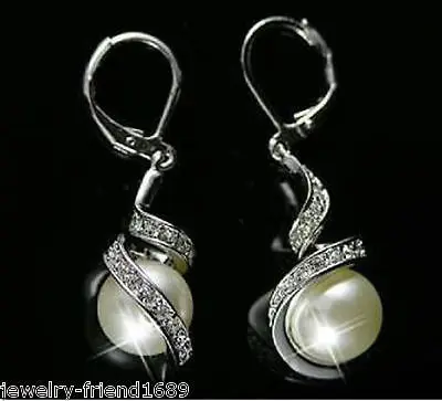 

FREE SHIPPING18K GP 10mm black shell pearl earring