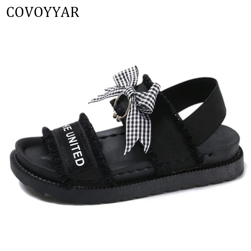 black bow flat sandals