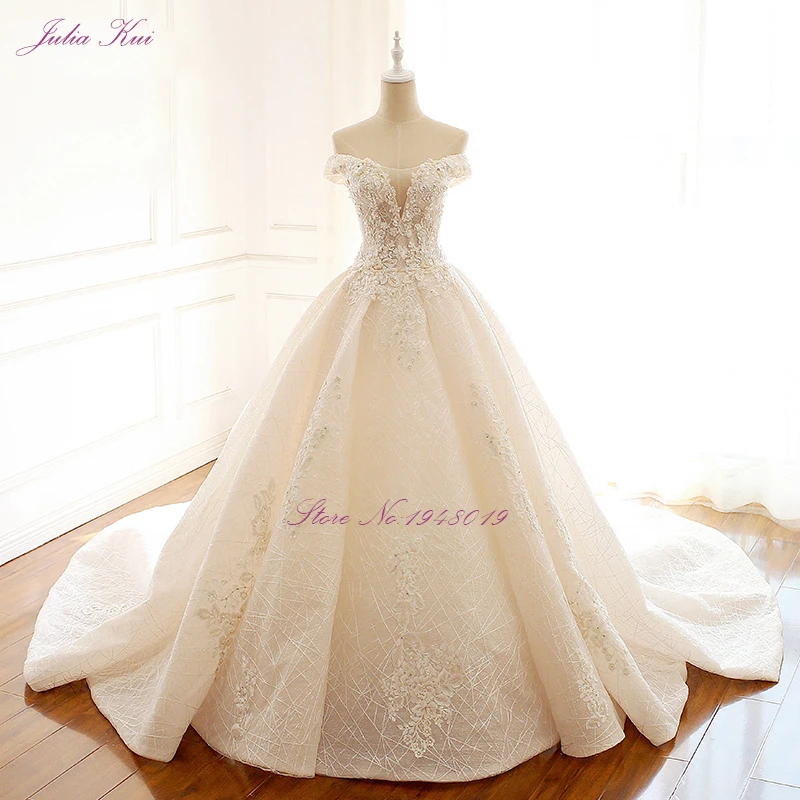 

Julia Kui High-end Strapless Invisible Neckline Wedding Dresses With Pearls Beading Ball Gowns Robe de Mariage